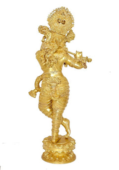 Brass Krishna flute figurine, rear view with ornate crown and flowing details