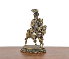Brass Baba Ramdev on horse, side view with patterned base and accessories, 5 inch