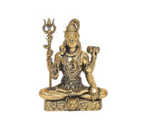 Brass Lord Shiva statue seated, trident raised, right hand holding small object on base.