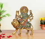 Brass Durga Maa idol on lion, teal and red jeweled detailing, front view