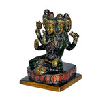 Panch Mukhi Shiva brass idol, angled view with red patterned base and green highlights