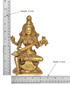 Brass Saraswati statue with size markings: 8 in height, detailed seated veena pose