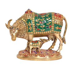 AONA brass Kamdhenu cow with calf showpiece, green and red jeweled design