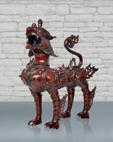 Temple lion statue, metallic dark red-brown finish, open mouth, ornate mane and armor