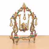 Front view of brass Ganesha swing idol with multicolor accents and centered hanging bells