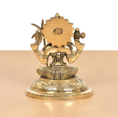 Golden Kamakshi Amman statue back view, circular back halo on round base