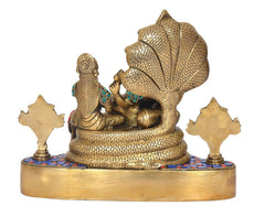 Brass Sheshnag idol statue with Lakshmi and Vishnu, multicolor accents, rear view
