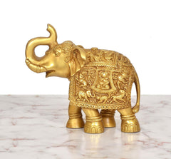 Brass elephant figurine in golden brass, full body view with ornate back panel