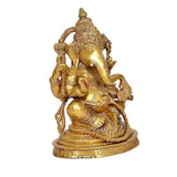 Brass Ganesha statue idol rear three-quarter view, ornate garlands and crown