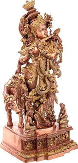 Krishna with cow statue, copper-toned brass, side view with ornate crown