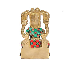 Back view of brass Gaja Lakshmi idol, elephant arch and jeweled details on attire.