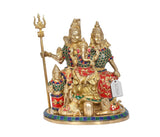 Front view of brass Shiv Parivar idol with Kartikeya and Ganesha, trident raised