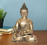 Brass meditating Buddha statue with lotus hand, seated posture, dark beaded hair