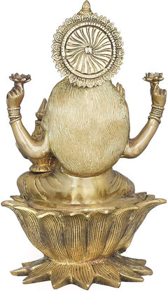 Back view brass Lakshmi idol statue on lotus base with halo-like circular ornament