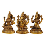Brass three seated deity idols with detailed crowns and jewelry