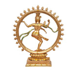 Dancing Nataraj Shiva resin idol with gold finish, green drape details, circular halo arch on base.