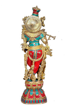 Brass Krishna murti back-left view, circular halo detail, red and teal outfit, standing on base