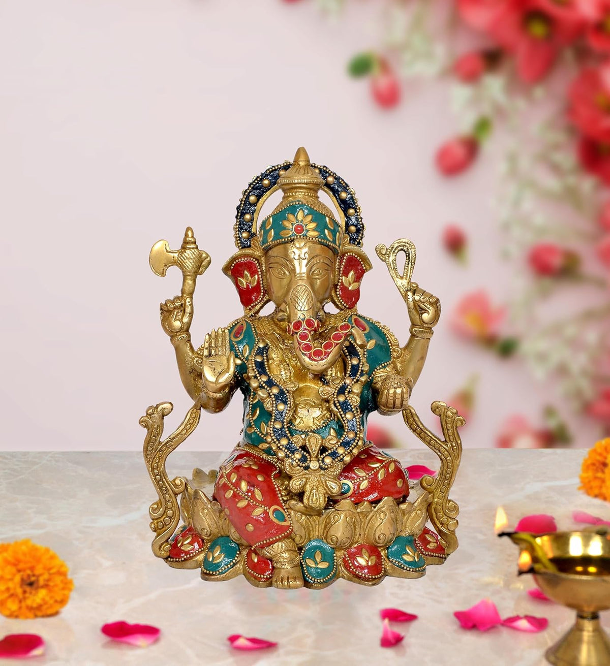 Brass Ganpati Murti for home temple, teal and red jeweled outfit, raised hands