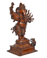 Brass Ganesha figure with 16 arms, detailed torso and legs, on engraved base