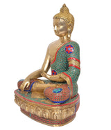 Brass meditating Buddha statue, side profile, teal and red patterned robe, dhyan hand pose