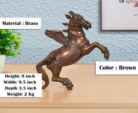 Brass flying horse with wings, front view, gold-brown sculpted mane and legs