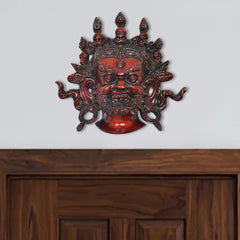 AONA Messing-Wandbehang mit Nazar-Battu Mahakala, mehrfarbig, Kopfdetail