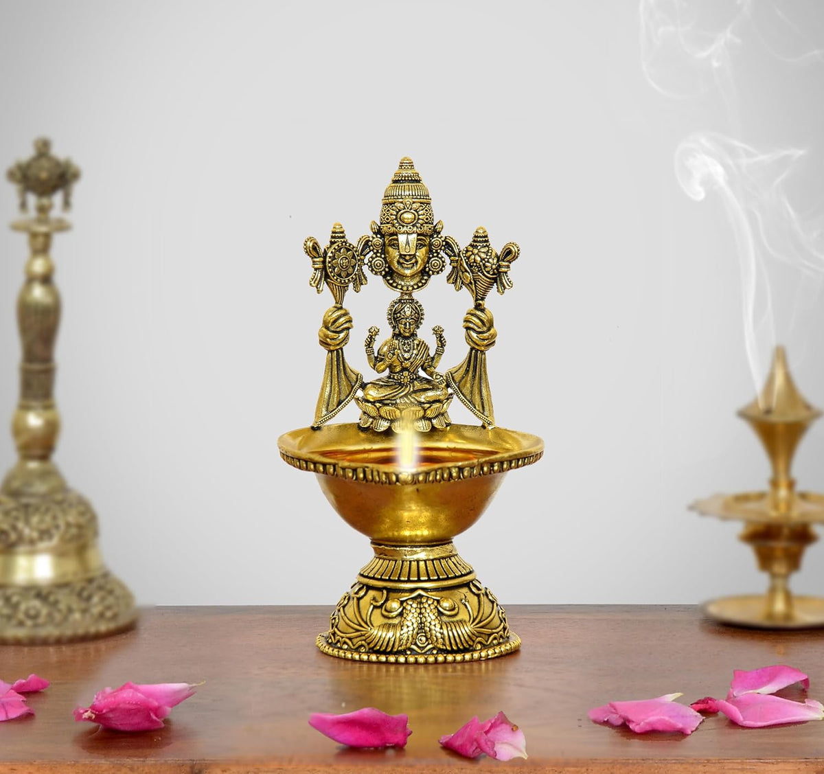 Brass oil diya with Tirupati Balaji and Goddess Lakshmi, open flame bowl top