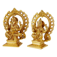 Brass Lakshmi and Ganesh sitting idols, three-quarter view