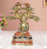 Brass Buddha tree showpiece with seated Buddha and jeweled canopy, multicolor accents