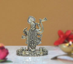Brass Shreenathji Thakurji statue, 4 inch, raised right hand on ornate pedestal