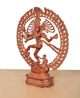 Orange brass Natraj Lord Shiva idol, side view with swinging legs and multi-armed details