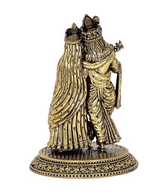 Radha Krishna brass idol statue facing side, ornate dress and circular base, 5 inch