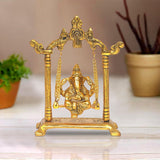 Golden metal Ganesh Ji swing idol with ornate pillars and hanging chains, 7 inch