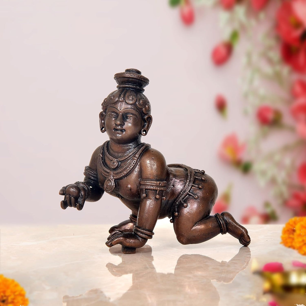 Bal Gopal Krishna laddu idol in dark copper bronze, kneeling with arms out, 4 inch