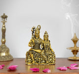 Golden brass Shiva and Parvati idol, seated on lotus-style base, height 3.5 in
