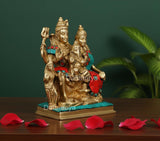 Brass Shiv Parivar idol, angled view with teal-and-red accents and raised hand, 6 inch