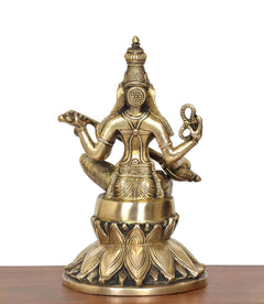 Brass Saraswati idol back-left angle, seated with veena and raised left hand
