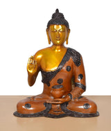 Brass Buddha idol seated, Abhaya Mudra raised hand, draped robe with dot accents