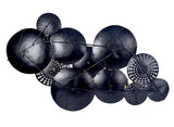 Abstract iron wall decor with dark metal disc fans and dot details, 3D design