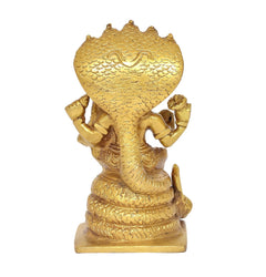 Gold brass Lakshmi Narasimha statue back view with detailed serpent-hood hood