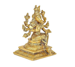 Golden Varahi idol figurine, side view with sculpted drapery and ornate base