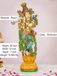 Hand-painted Krishna playing flute statue in multicolor resin, side view