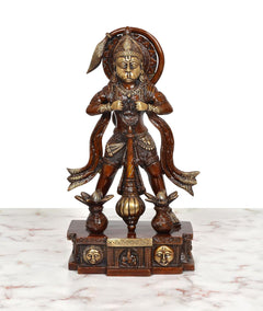 Brass Hanuman idol standing pose, ornate crown, hands folded over chest, decorative base