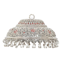 Silver chattar dome with red accents, detailed scroll carving, and hanging bell beads
