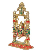 Brass Ganesha swing jhula temple decor with detailed pillars and gold frame
