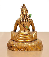 Back view of Lord Shiva resin sculpture, long hair detail and green sash on the back.
