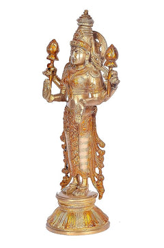 Brass Lakshmi statue side view, four arms held with decorative finials