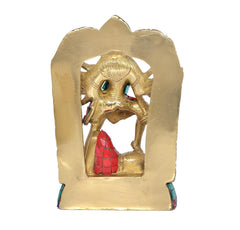 Brass Kali idol rear view, detailed halo and multicolor gemstone accents