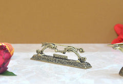 Brass Jai Shree Ram Dhanush pooja showpiece, angled view, engraved base and arch