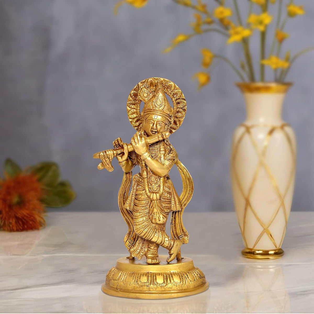 Brass Lord Krishna idol figurine, standing and playing flute on round base